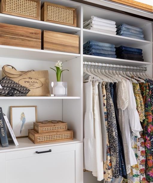 Closet organized by Curated Homes Collective
